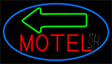 Red Motel With Green Arrow Neon Sign