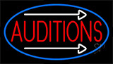 Red Auditions With White Arrow Neon Sign